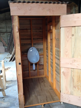 men's urinal hut - front hut view