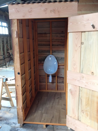 inside men's urinal hut