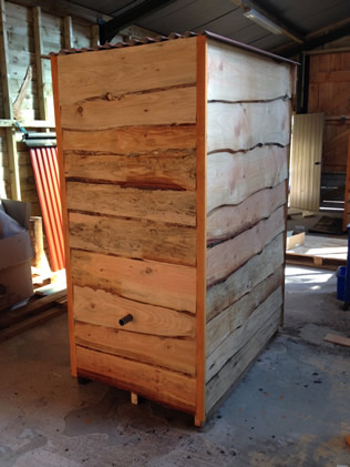 men's urinal hut - rear hut view